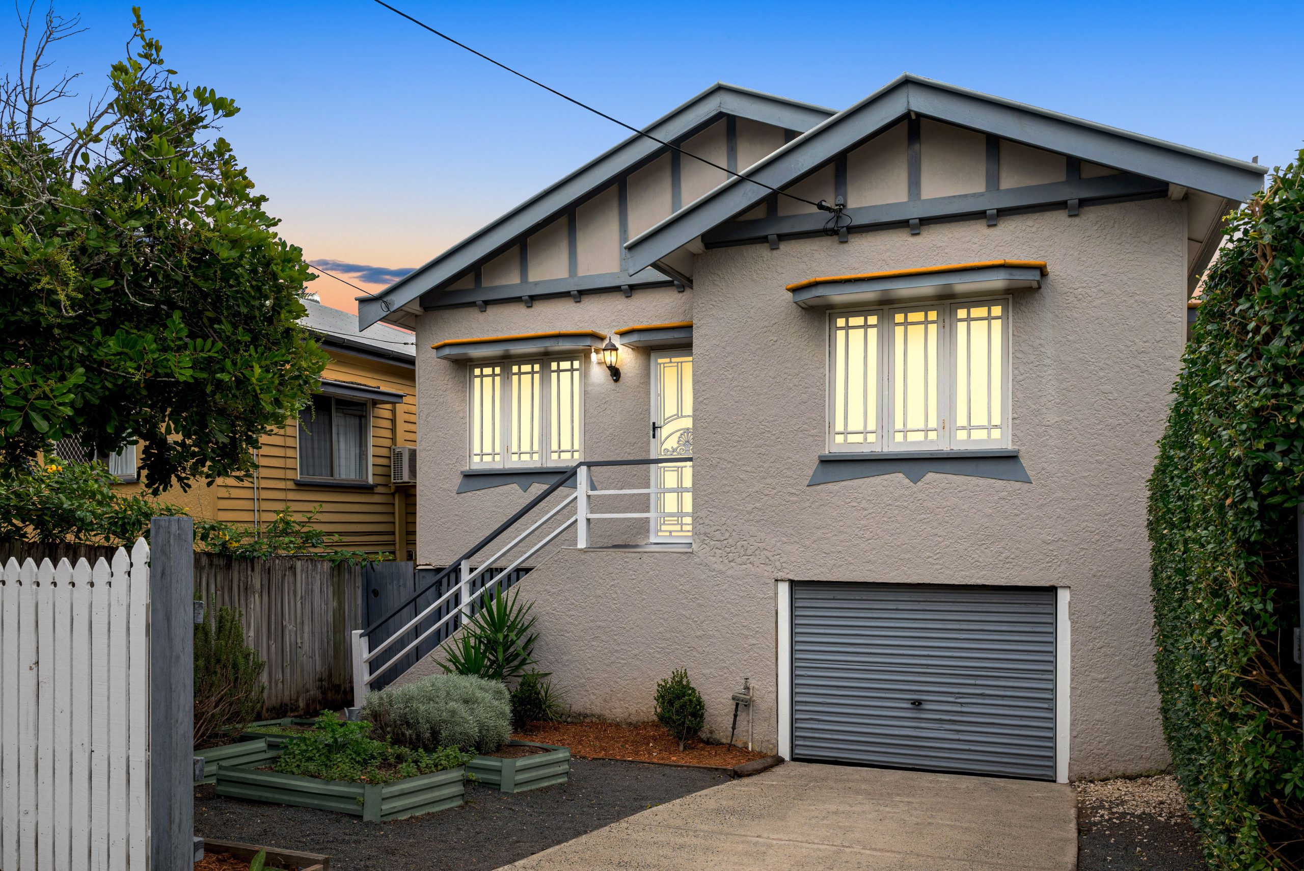 Renovated cottage facade in Red Hill, highlighted in Brisbane digital day to dusk photography